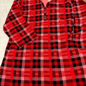 Red and black plaid blouse with 3/4 sleeve.